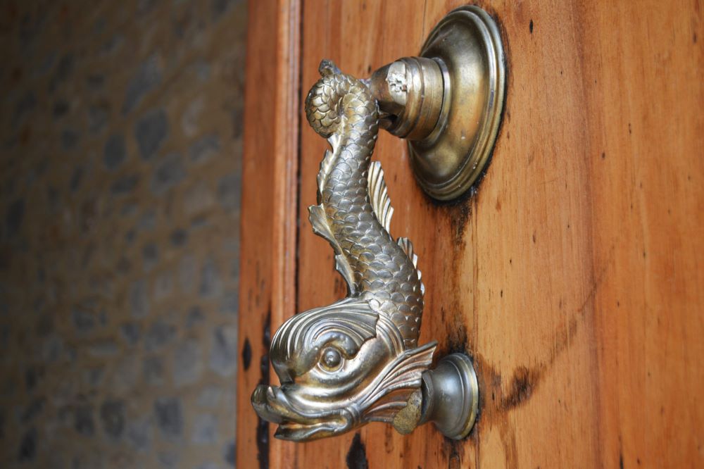 heurtoir de porte en forme de poisson