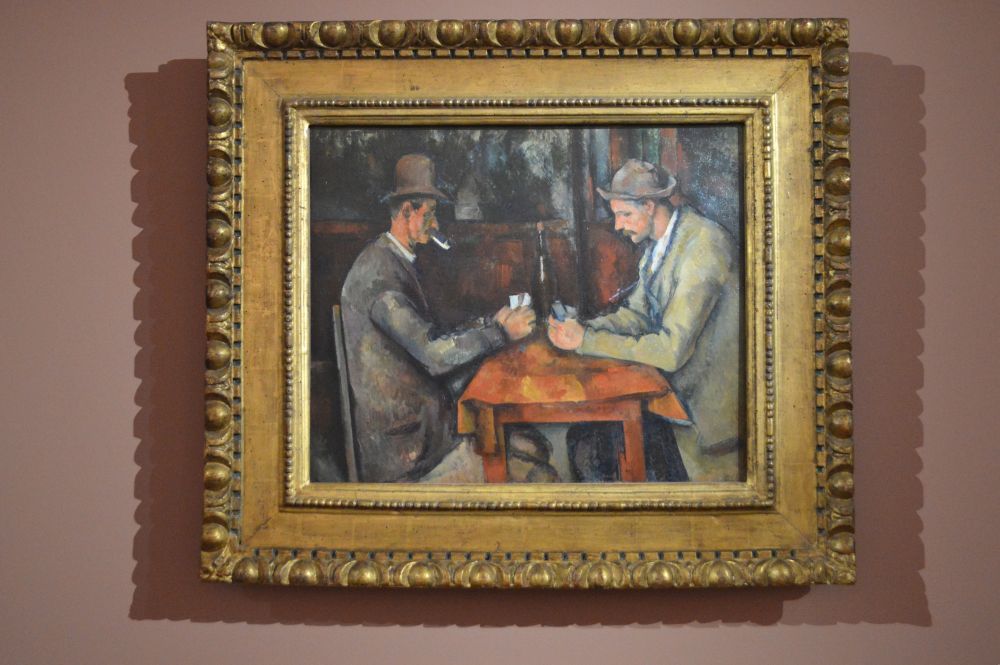 tableau de Paul Cezanne représentant une partie de cartes