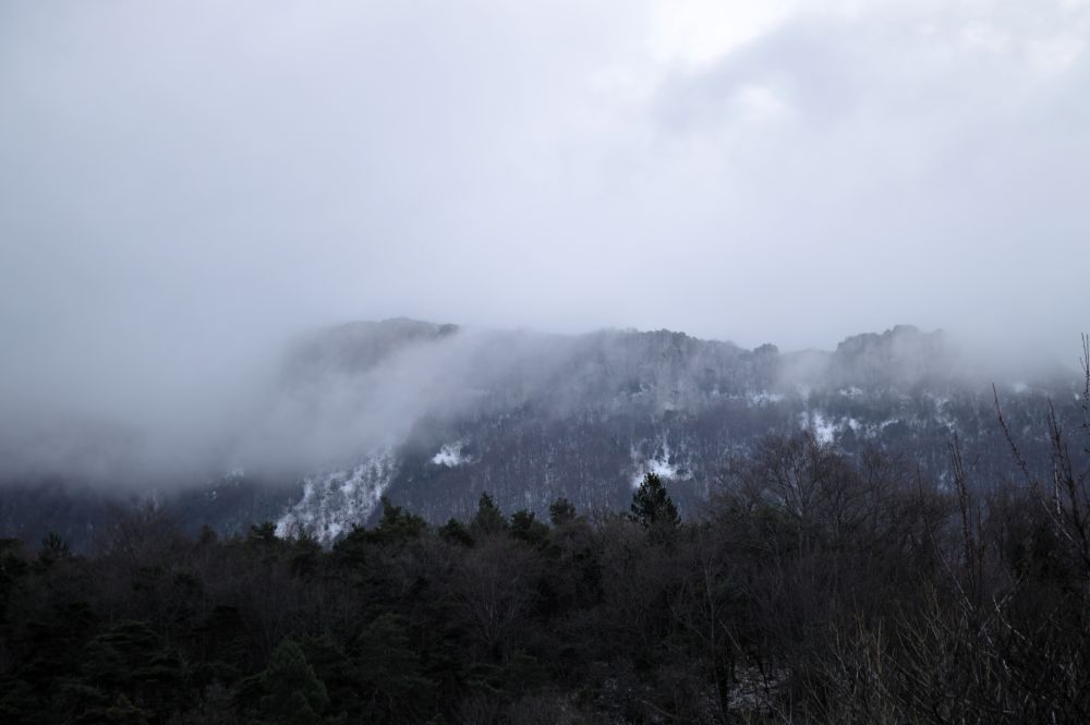 vue sur le Vercors dans les nuages depuis Peyrus